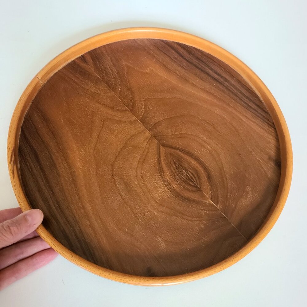 Wooden round serving tray.